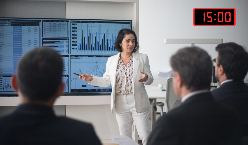 Speaker using a countdown timer to stay on track during a professional presentation